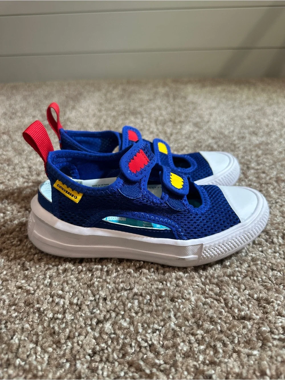 Converse Kids Navy Blue Mesh Sneakers with Red and Yellow Accents